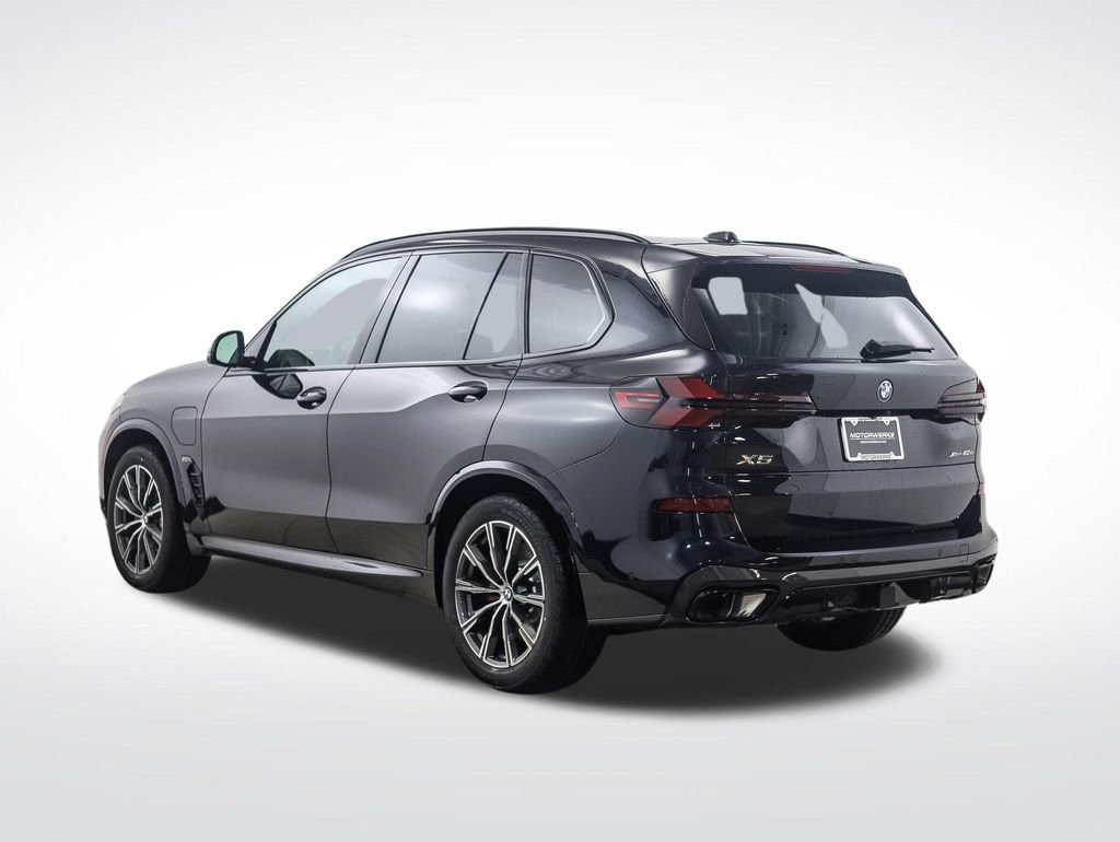 Used 2026 Carbon Black Metallic BMW xDrive50e image 3