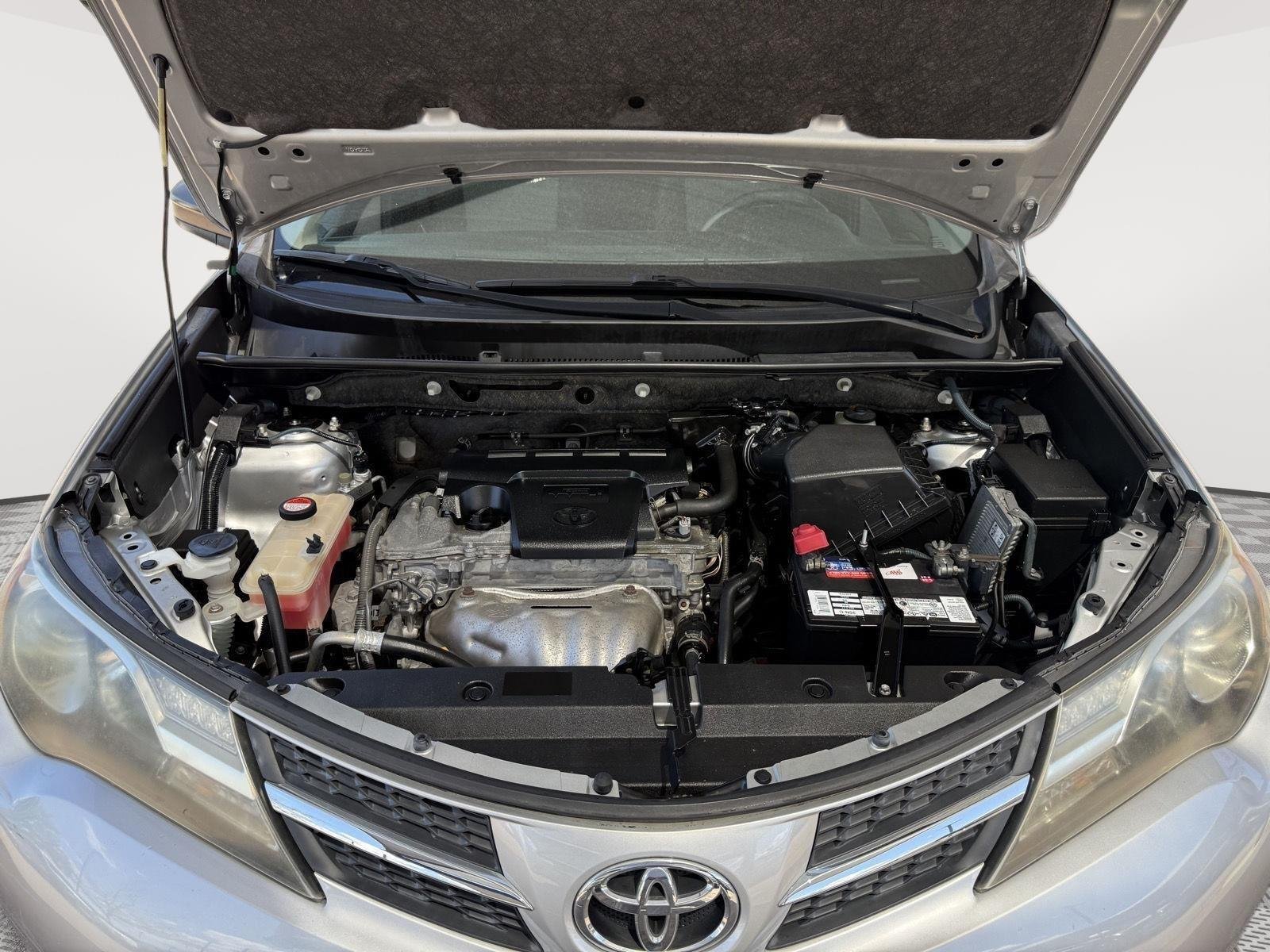 Used 2014 Classic Silver Metallic Toyota LE image 2