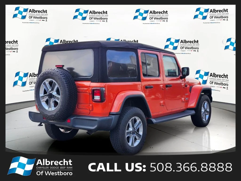 Used 2020 Orange Jeep Unlimited Sahara image 5