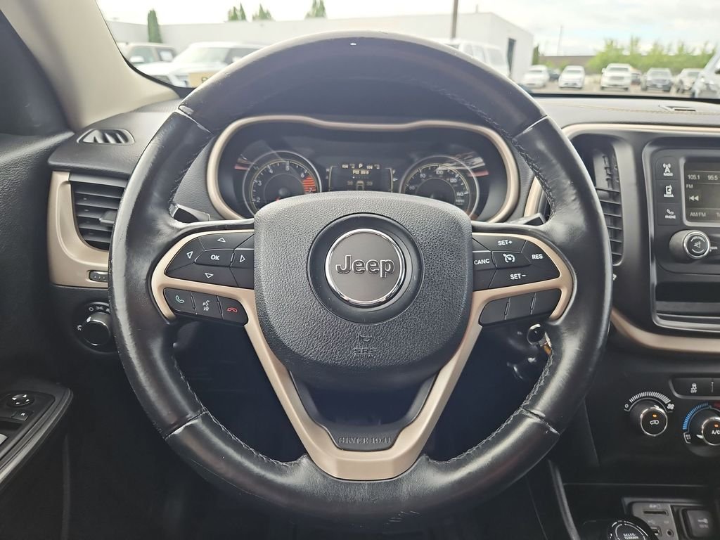 Used 2016 Granite Crystal Metallic Clearcoat Jeep Sport image 14