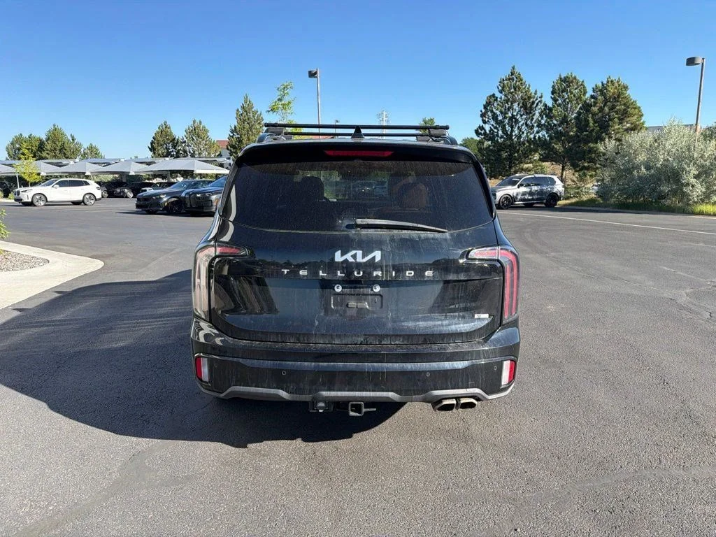 Used 2024 Ebony Black Kia EX X-Line image 4