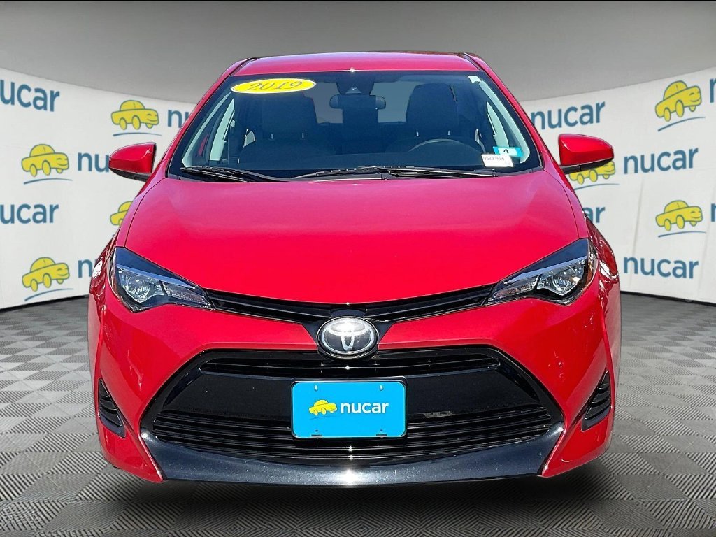 Used 2019 Red Toyota LE image 2