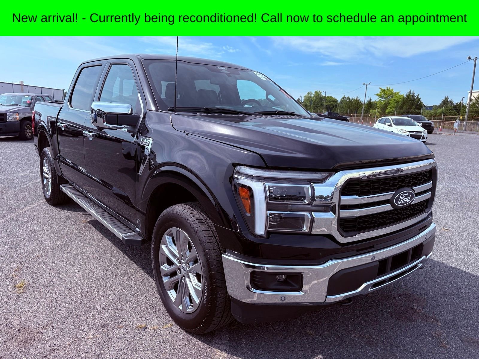 Used 2025 Black Metallic Ford Lariat image 1