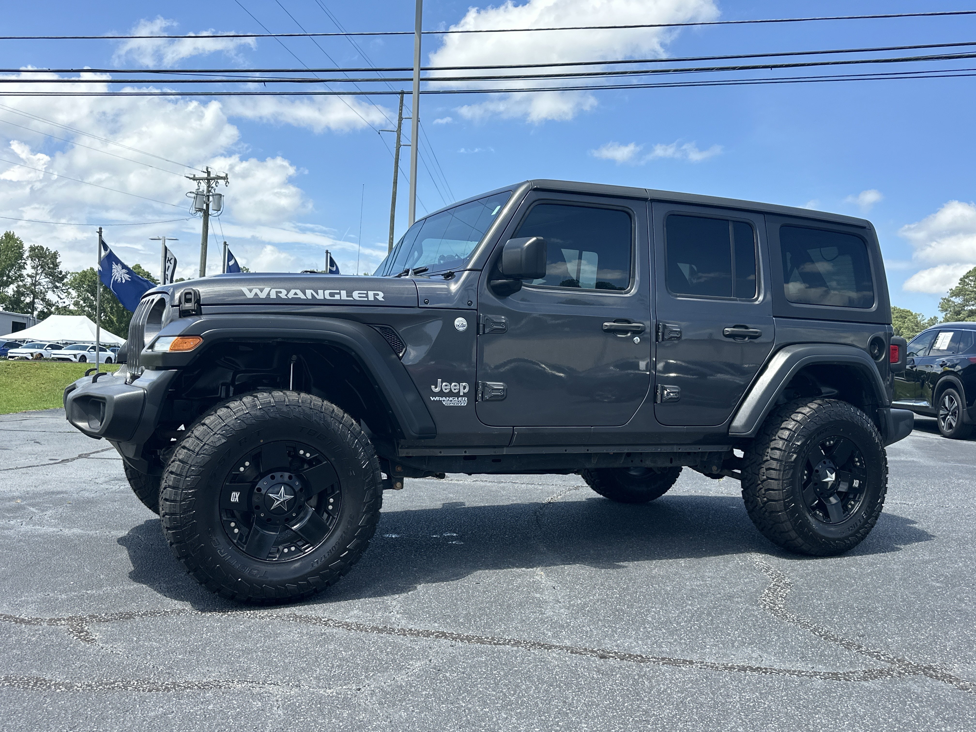Used 2020 Granite Crystal Metallic Clearcoat Jeep Sport S image 4