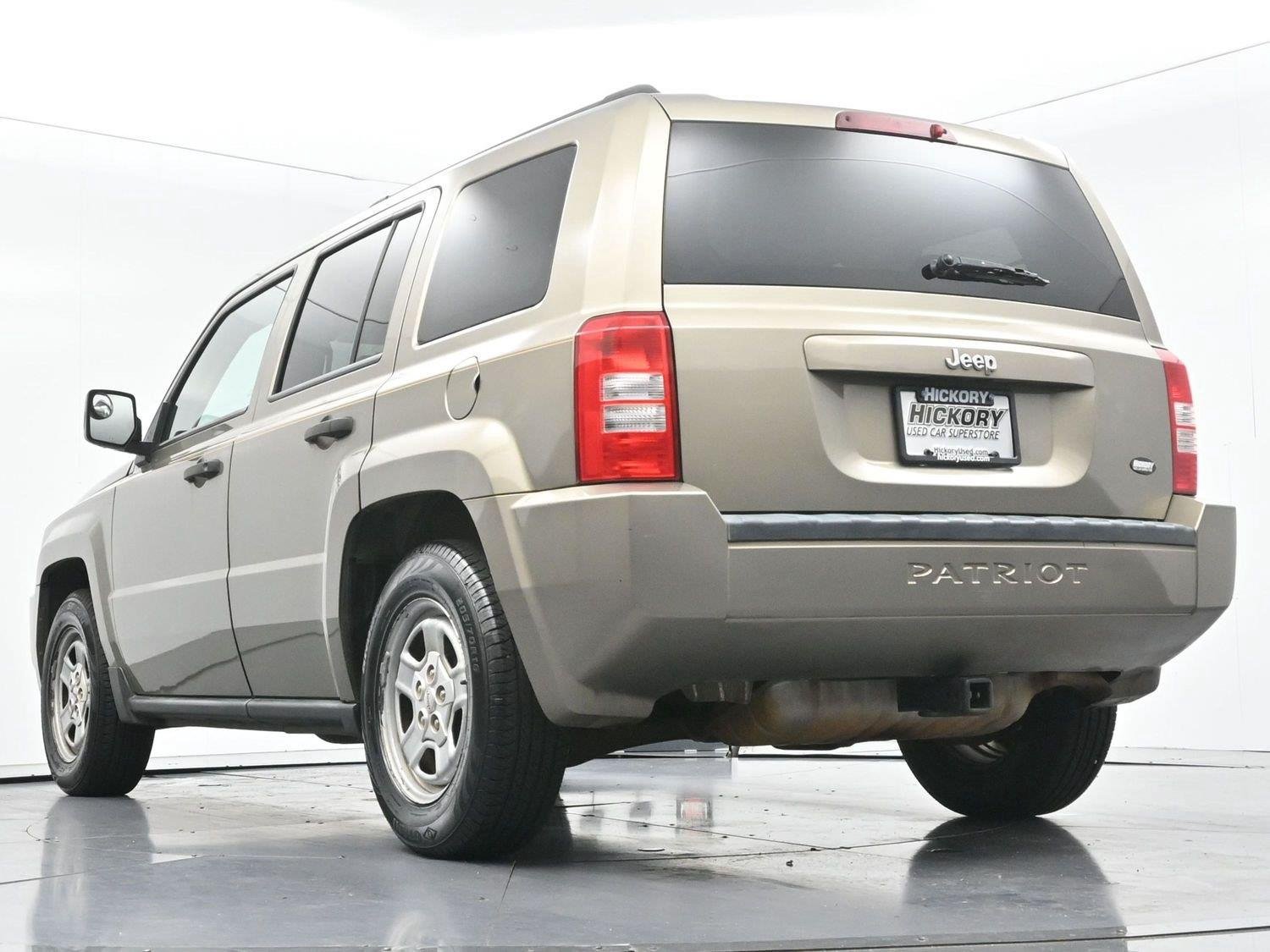 Used 2008 Light Khaki Metallic Jeep Sport image 42
