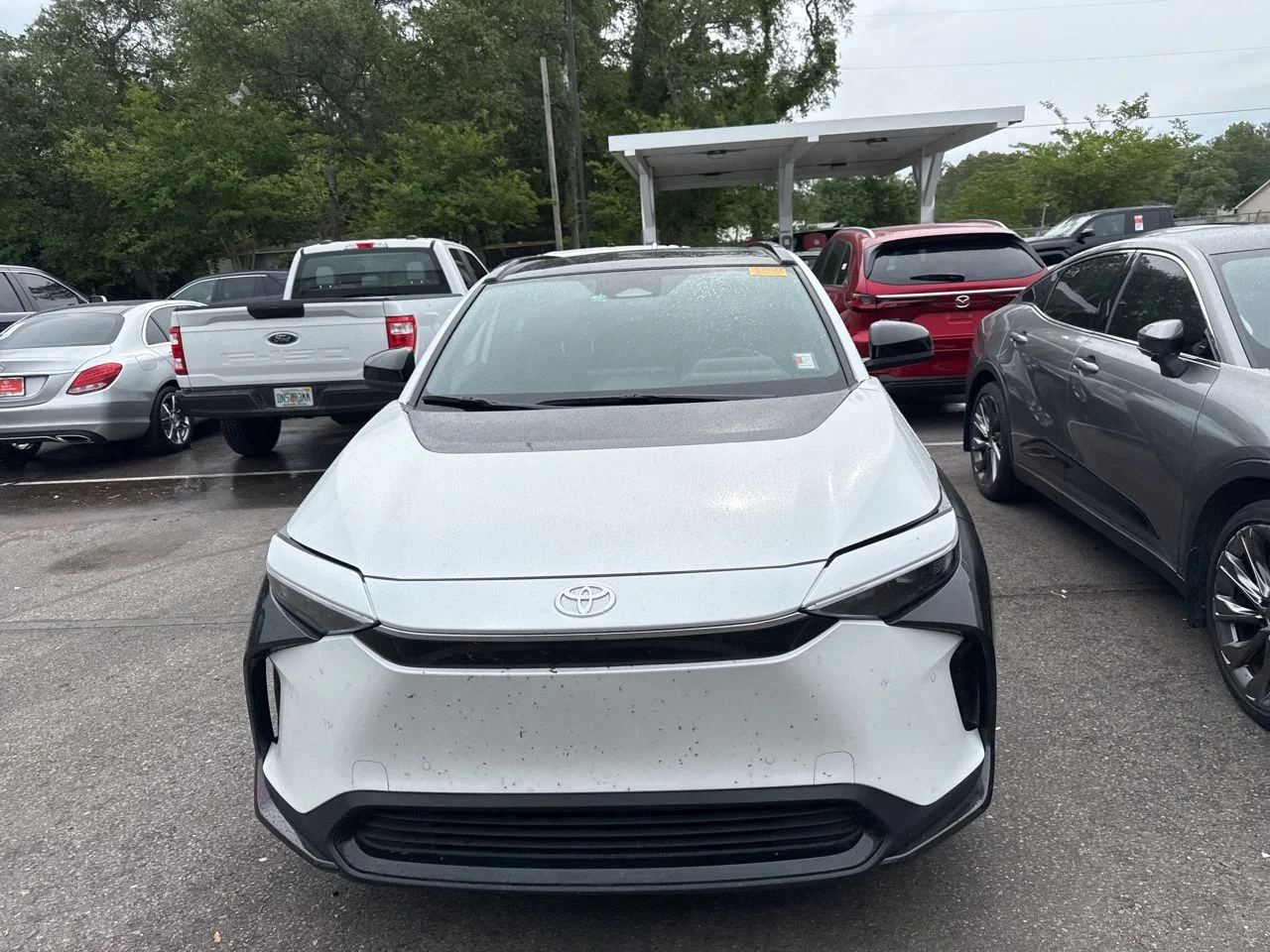 Used 2024 Toyota bZ4X XLE with VIN JTMABACA9RA078034 for sale in Fort Walton Beach, FL