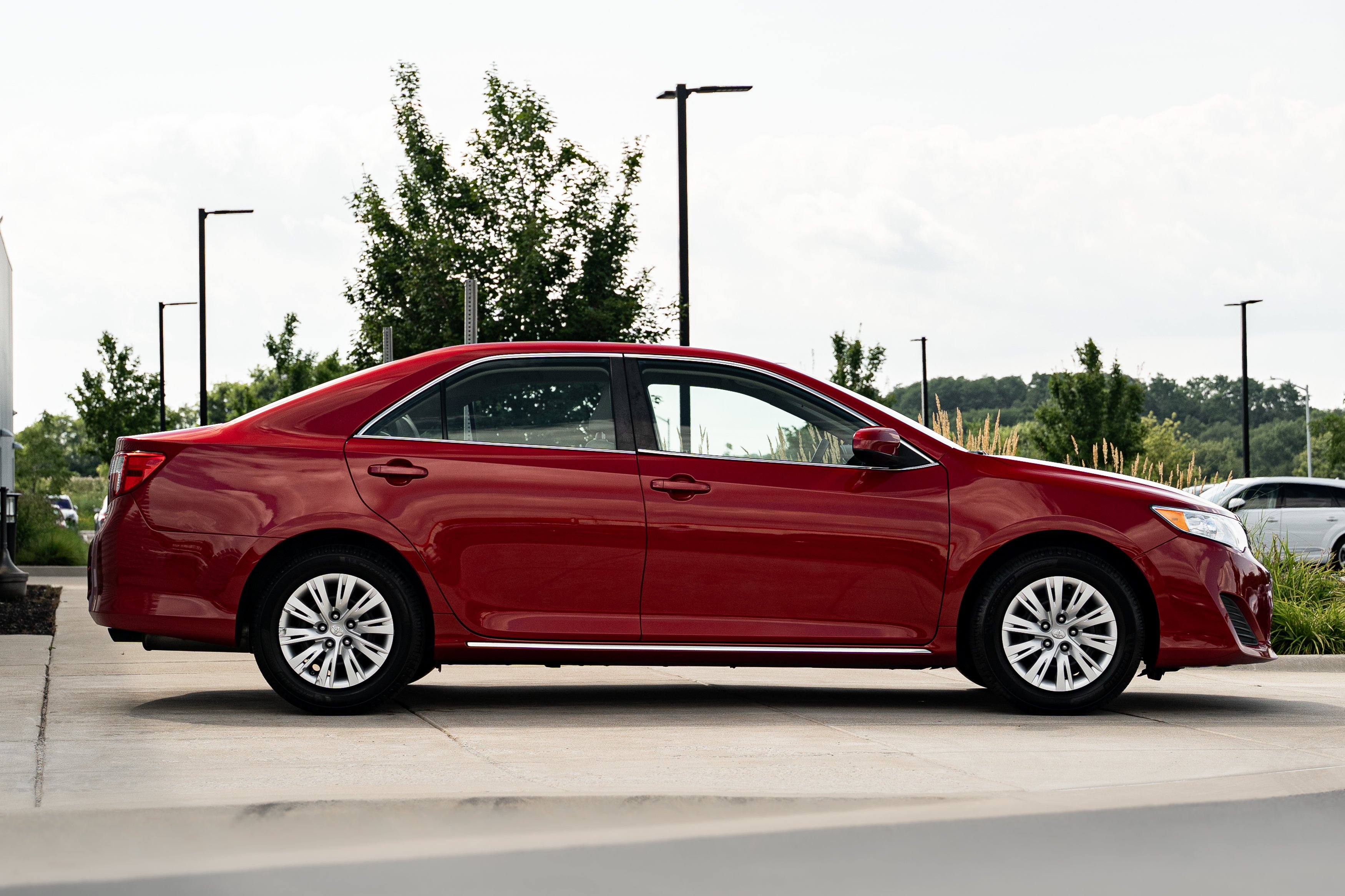 Used 2014 Barcelona Red Metallic Toyota LE image 3