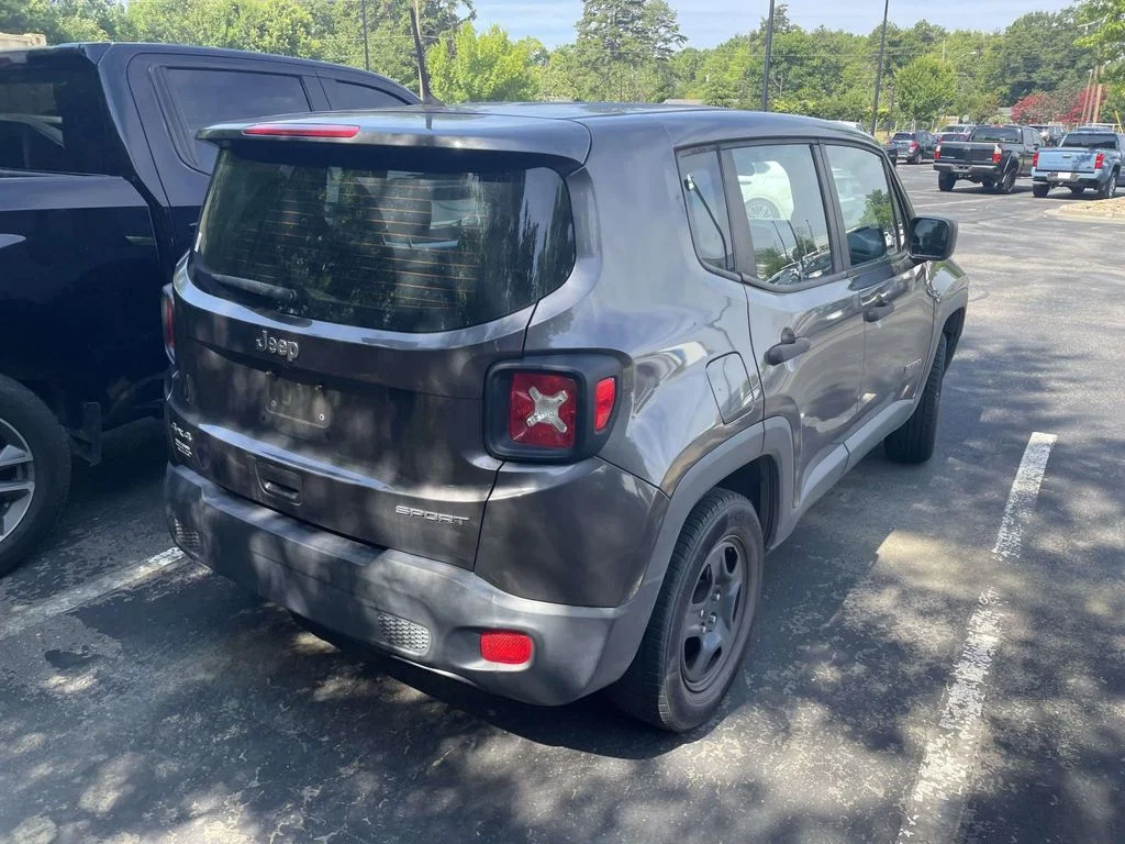 Used 2019 Granite Crystal Metallic Clearcoat Jeep Sport image 6