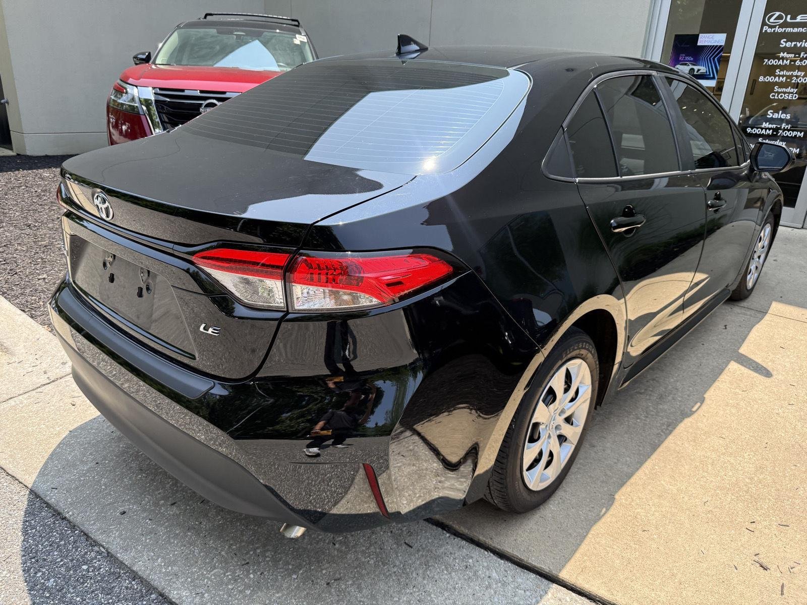 Used 2023 Midnight Black Metallic Toyota LE image 6