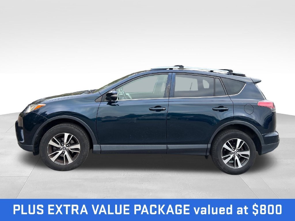 Used 2018 Toyota RAV4 XLE with VIN JTMRFREV0JJ734616 for sale in Midland, MI