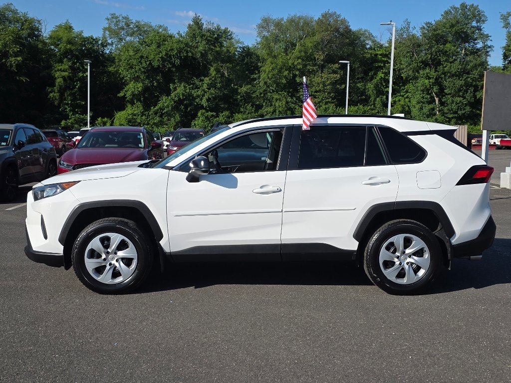 Used 2021 Super White Toyota LE image 10