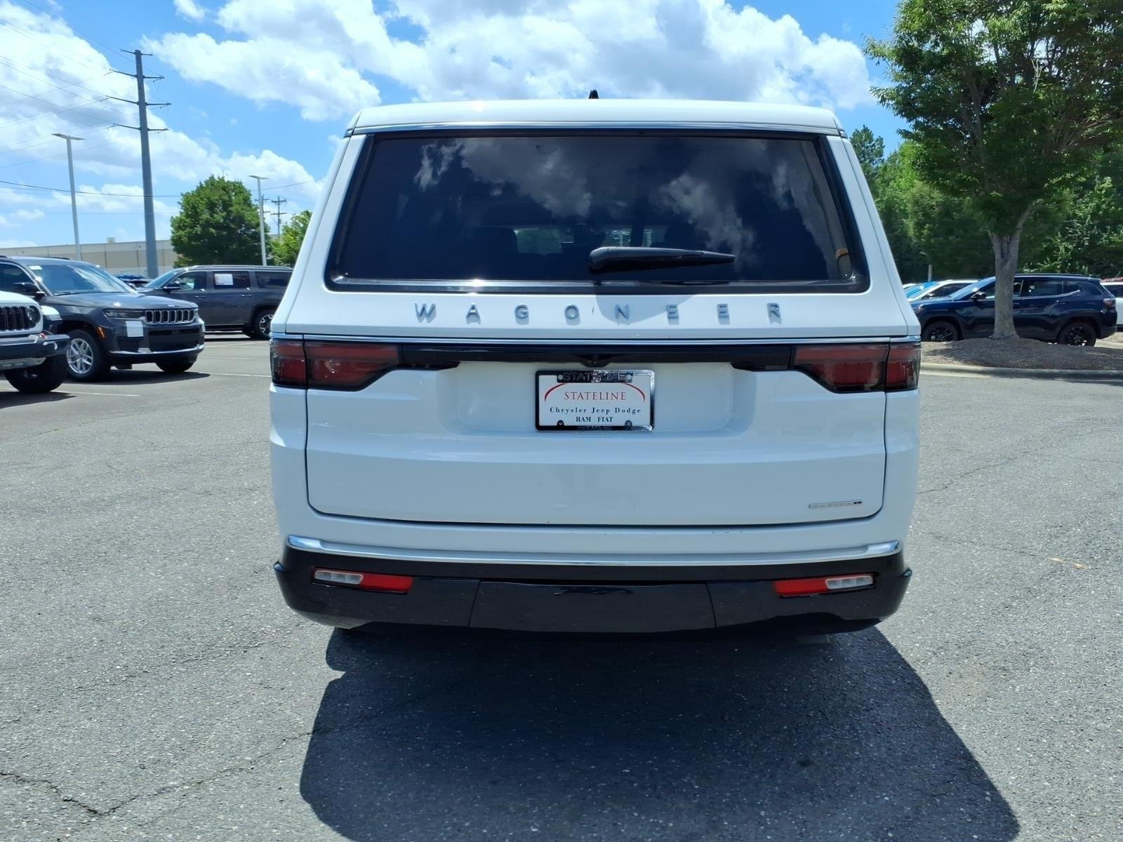 Used 2024 Bright White Clearcoat Jeep Series II image 10
