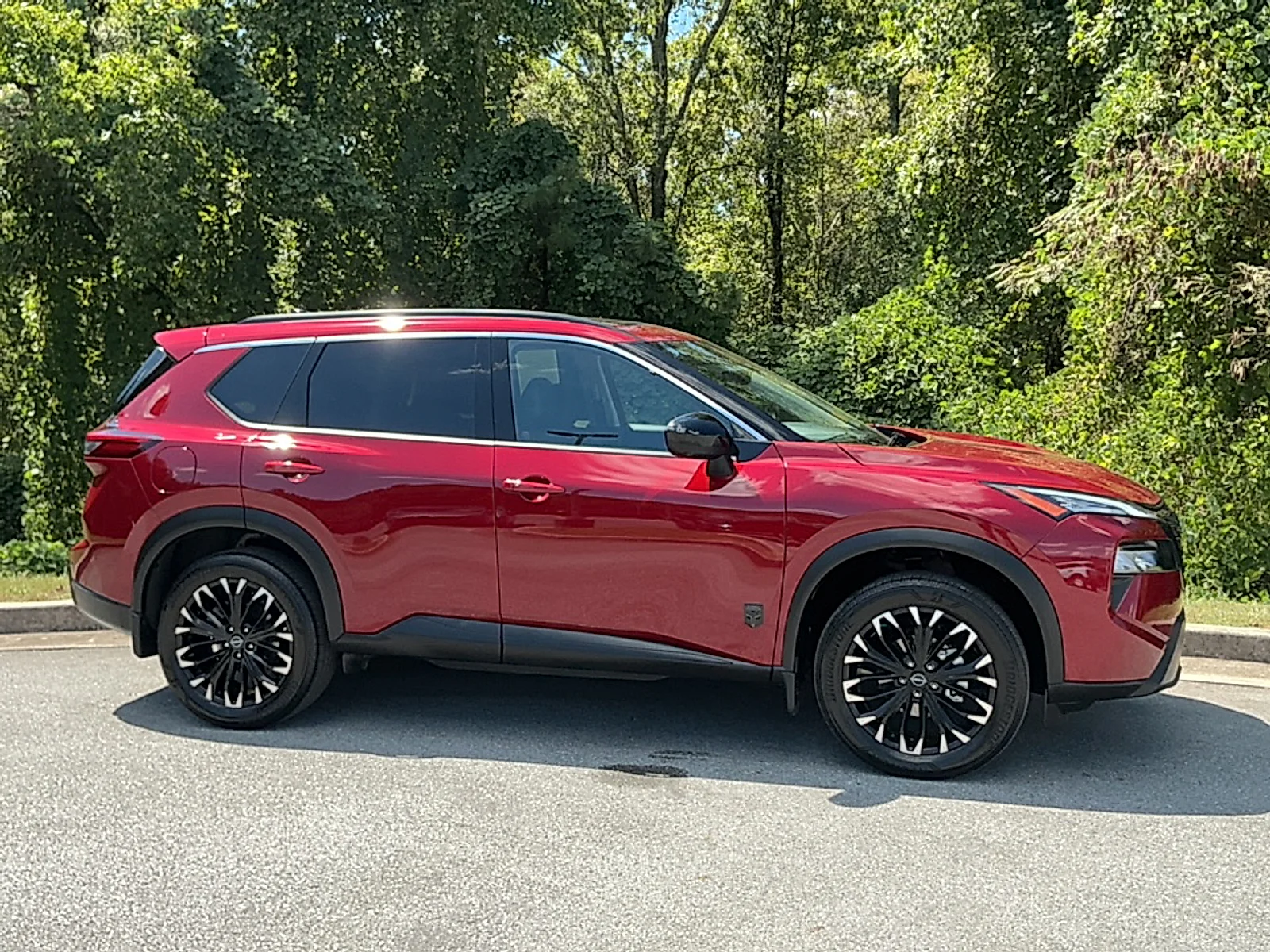 Used 2026 Scarlet Ember Tintcoat Nissan Dark Armor image 1