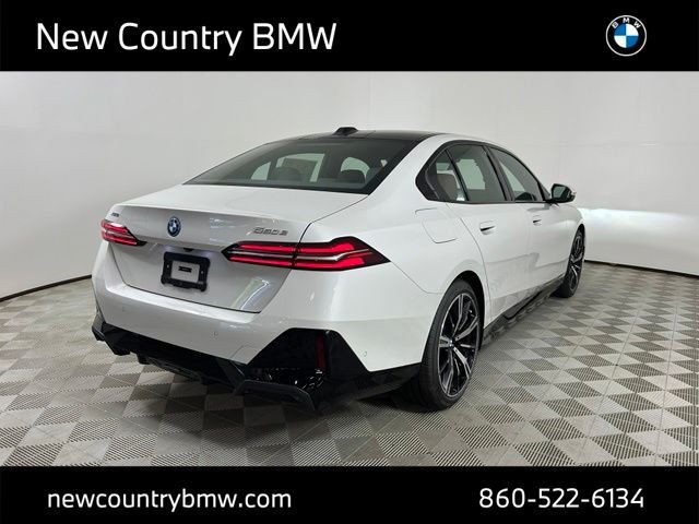 New 2026 Mineral White Metallic BMW 550e xDrive image 7