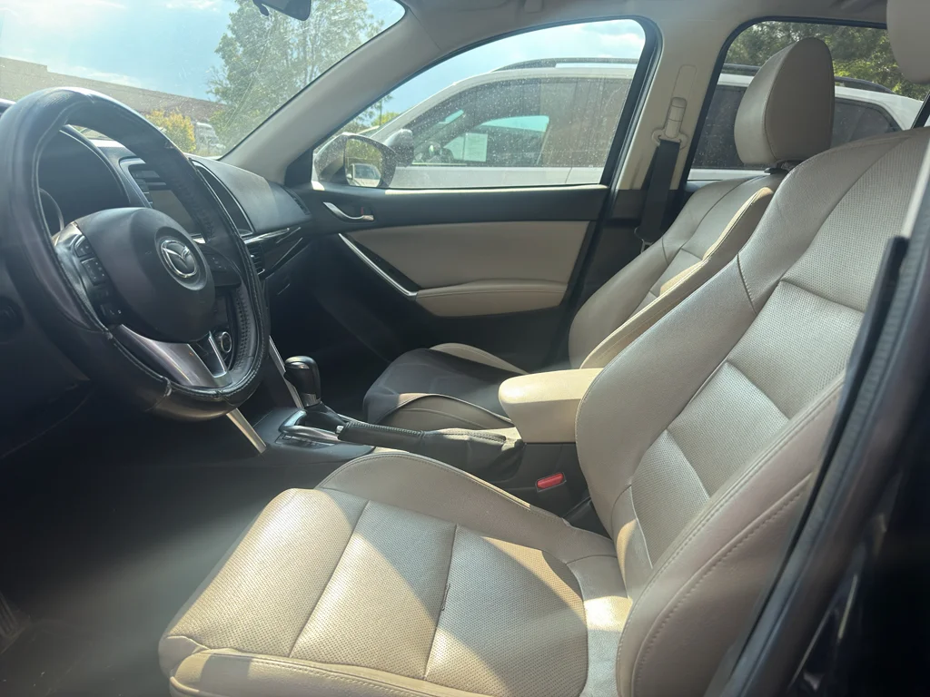 Used 2015 Mazda CX-5 Grand Touring with VIN JM3KE2DY2F0526975 for sale in Santa Fe, NM