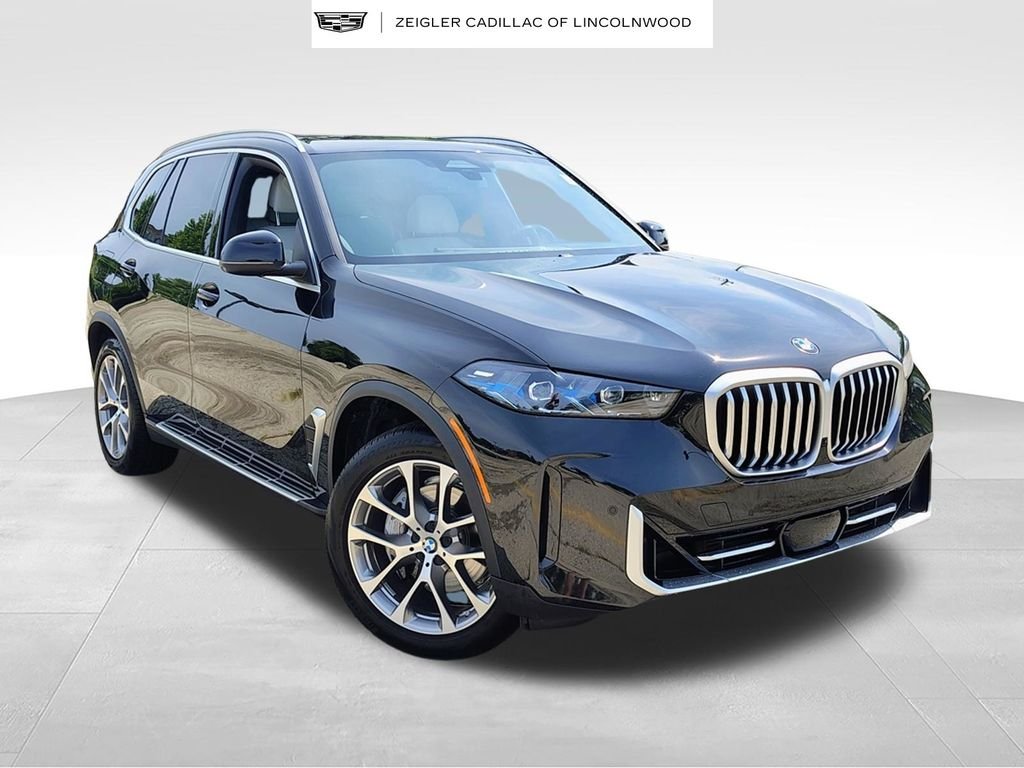 Used 2026 Black BMW xDrive40i image 1