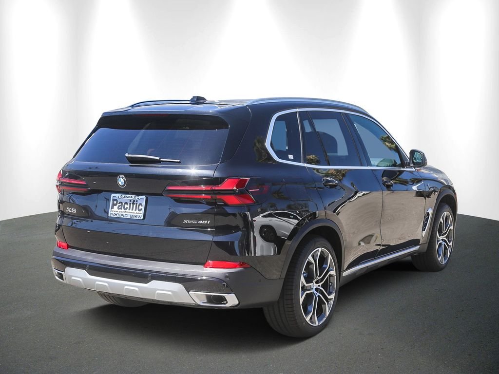New 2026 Black Sapphire Metallic BMW xDrive40i image 6
