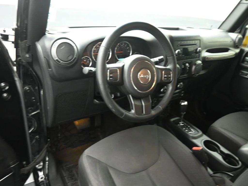 Used 2015 Black Jeep Unlimited Sport image 9