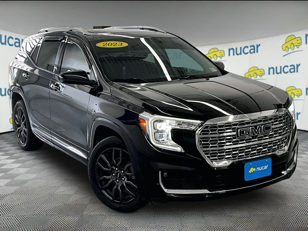 Used 2023 Ebony Twilight Metallic GMC Denali image 1