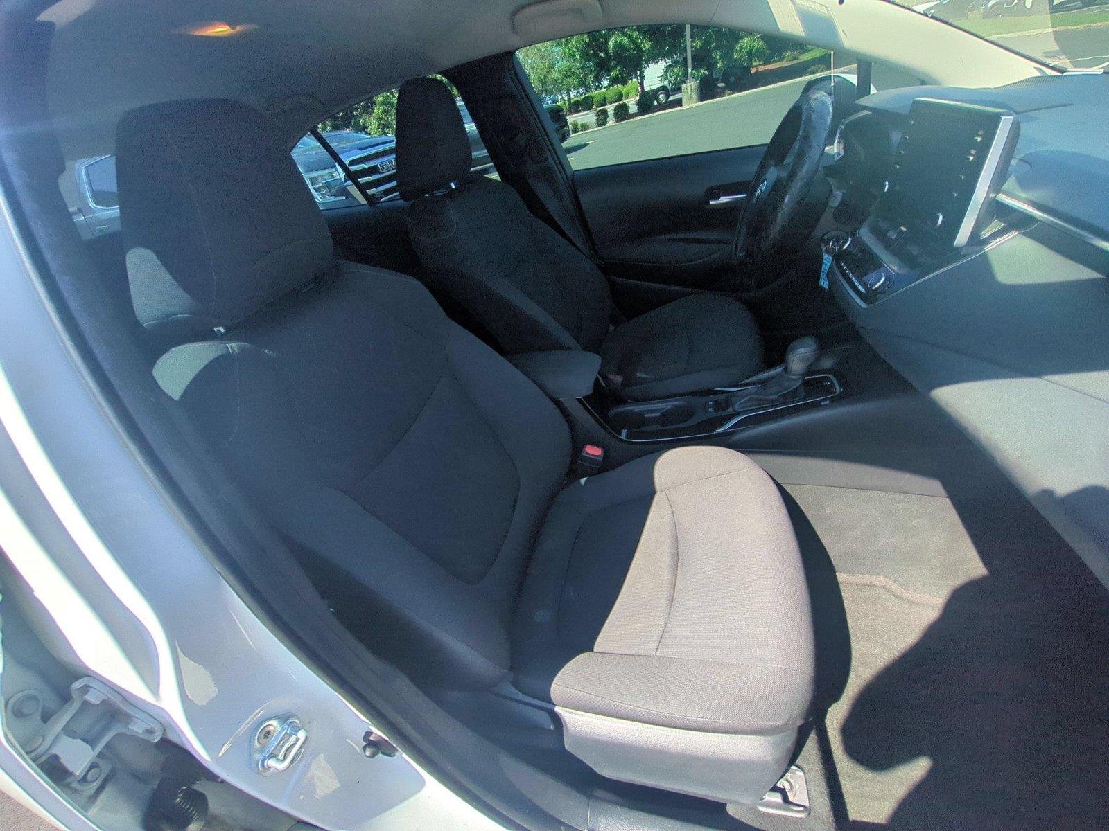 Used 2021 Super White Toyota LE image 34