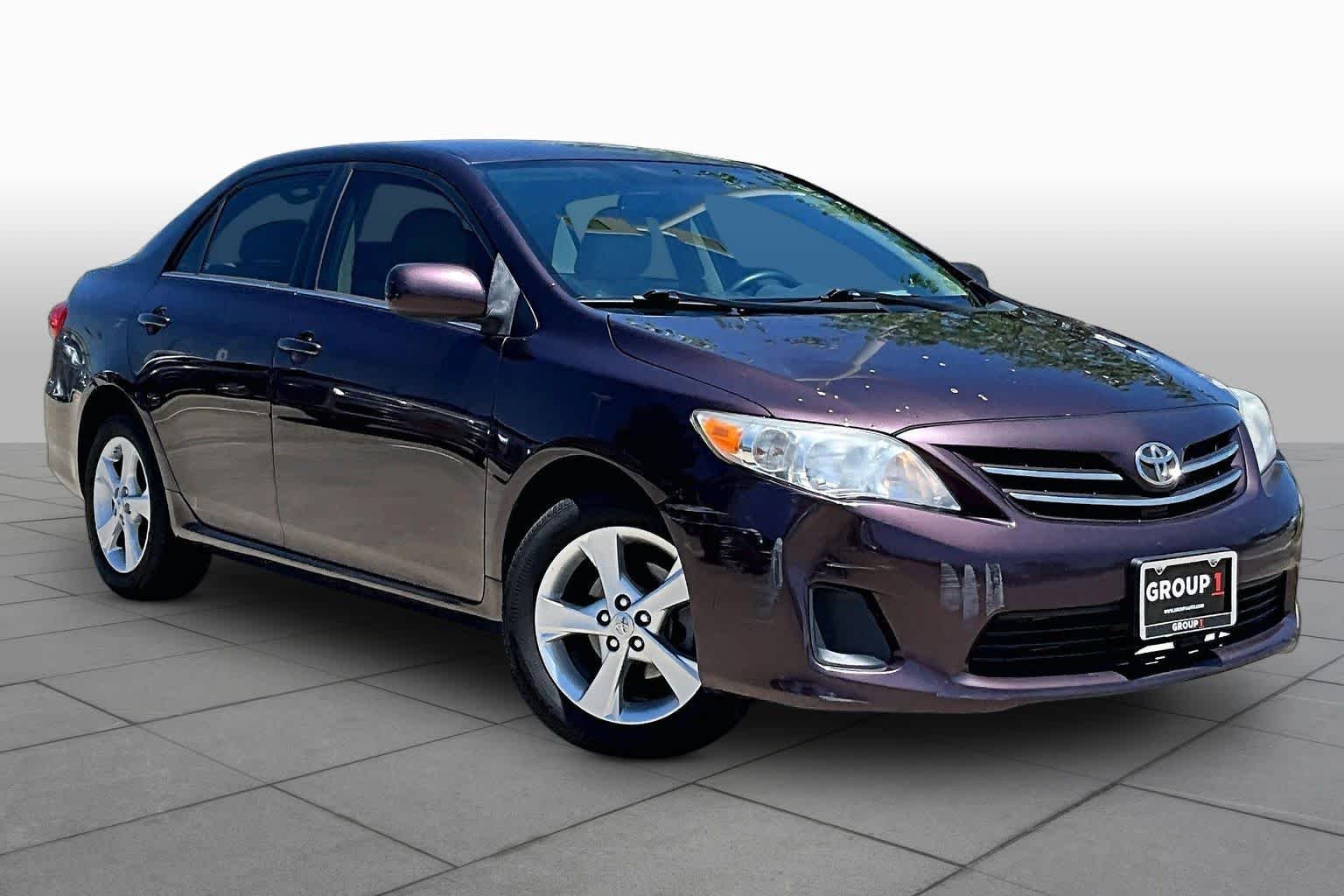 Used 2013 Black Currant Metallic Toyota LE Special Edition image 3