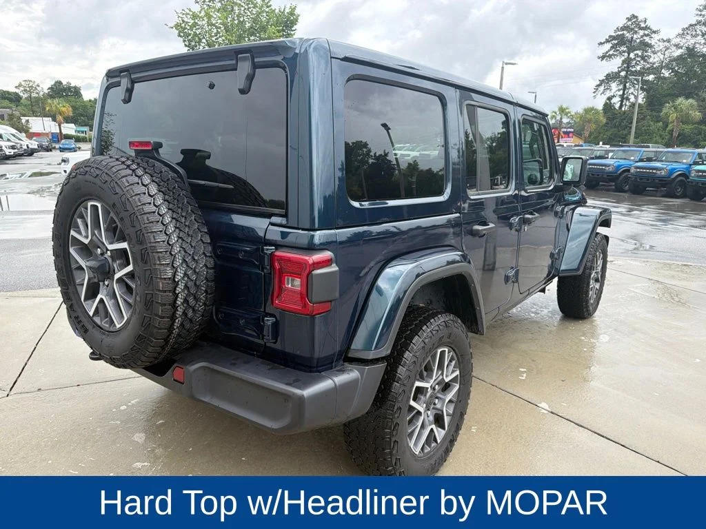 Used 2025 Fathom Blue Pearlcoat Jeep Sahara image 8