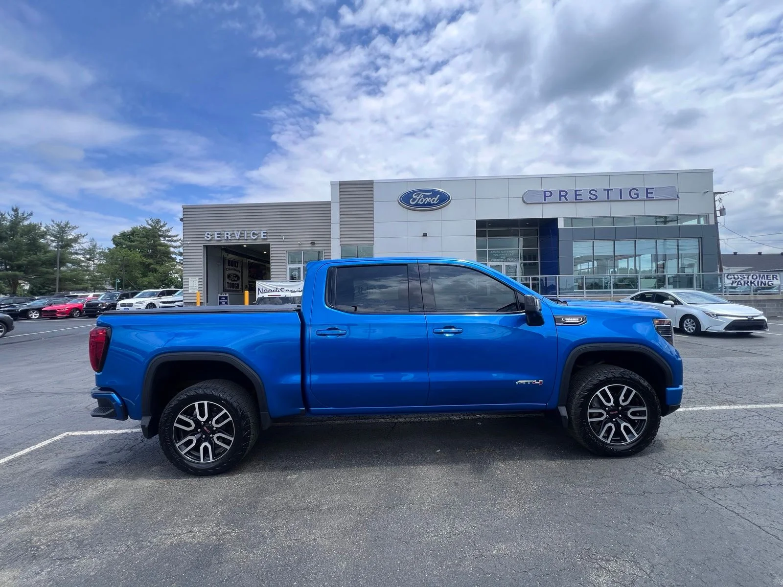 Used 2024 Blue Metallic GMC AT4 image 7