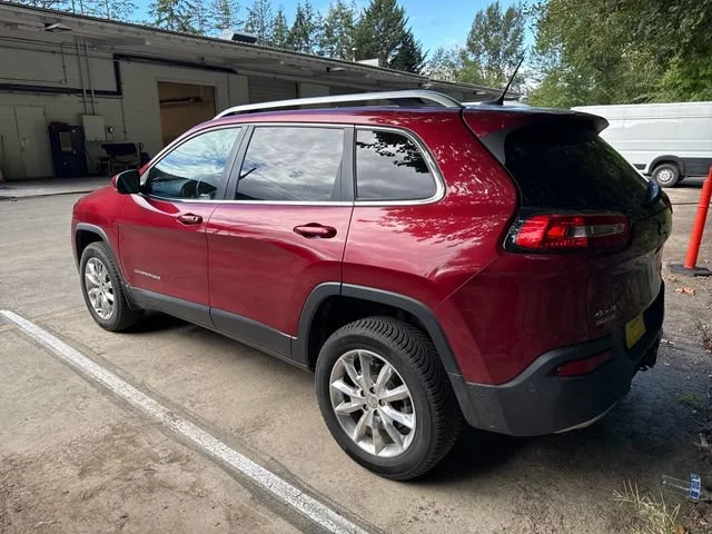Used 2015 Deep Cherry Red Crystal Pearlcoat Jeep Limited image 5