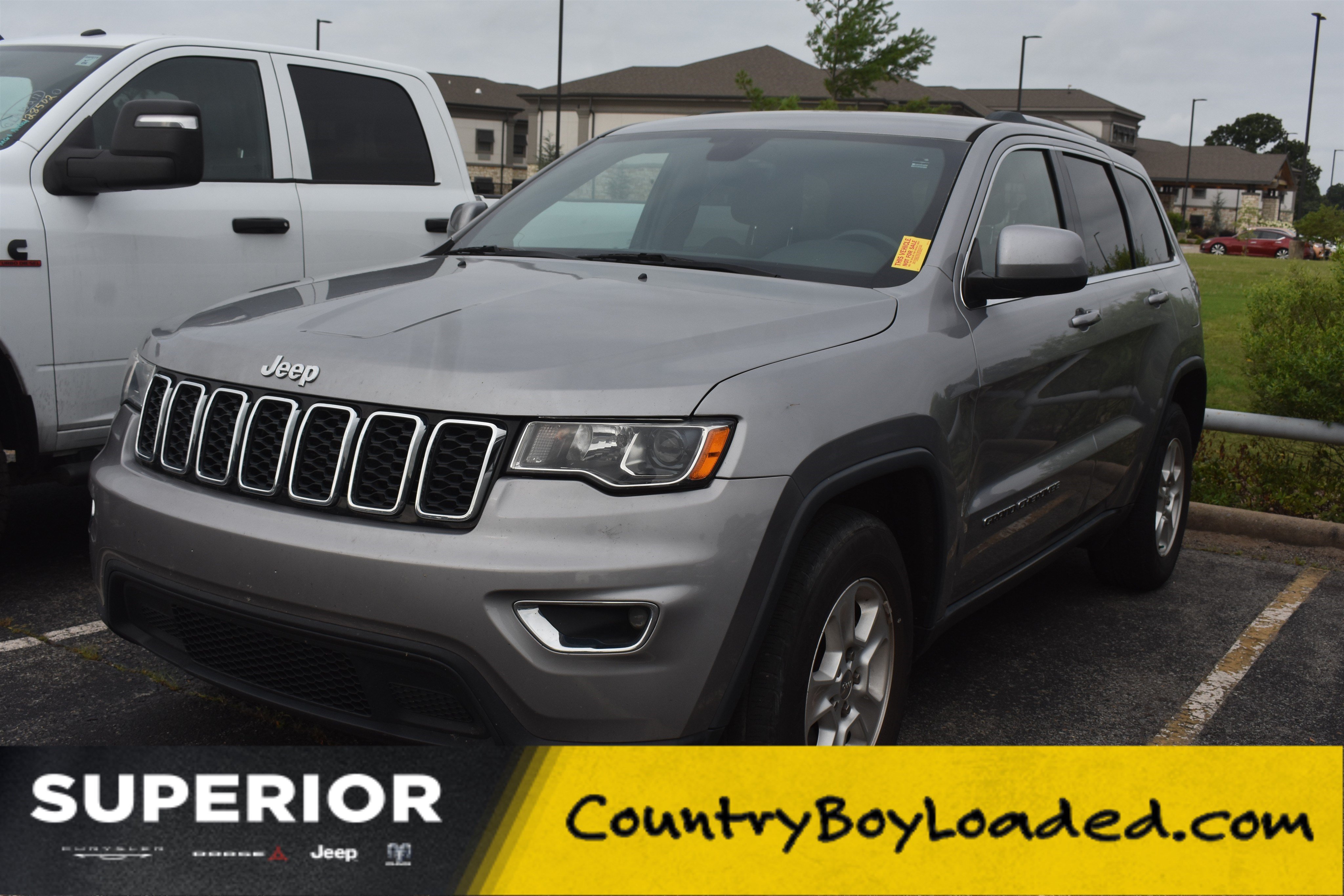 Used 2017 Billet Silver Metallic Clearcoat Jeep Laredo image 1