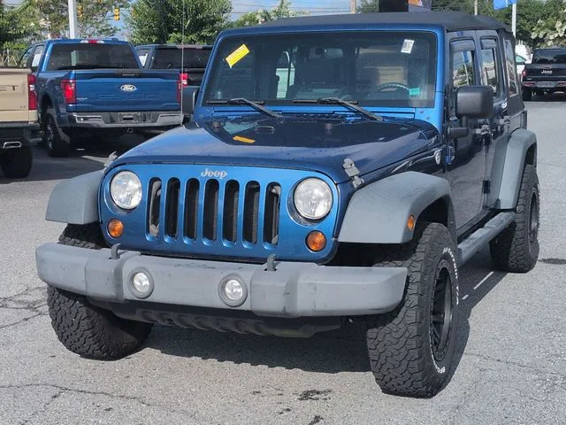 Used 2010 Blue Jeep Unlimited Sport image 3