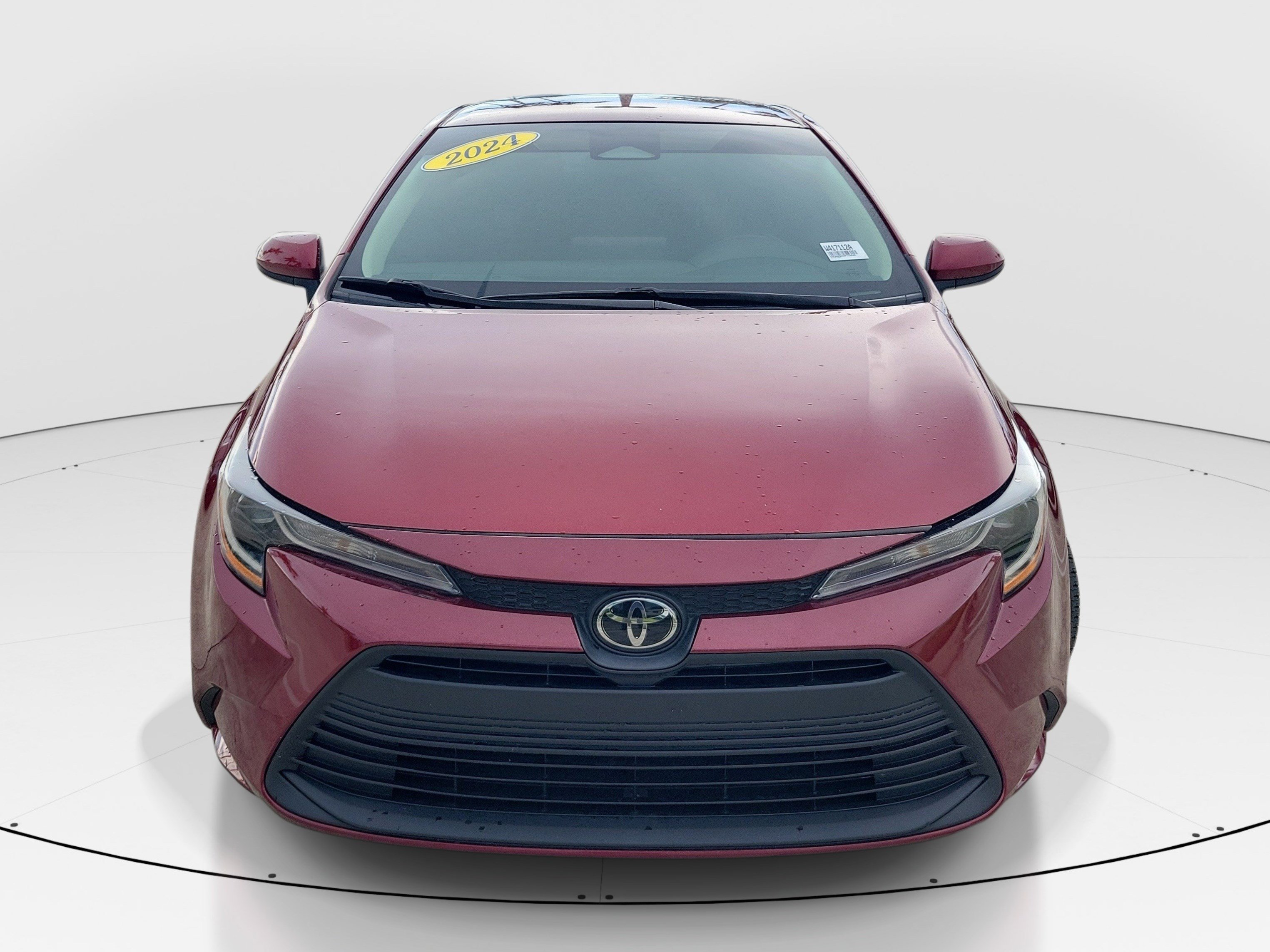 Used 2024 Ruby Flare Pearl/Midnight Black Metallic Toyota LE image 2