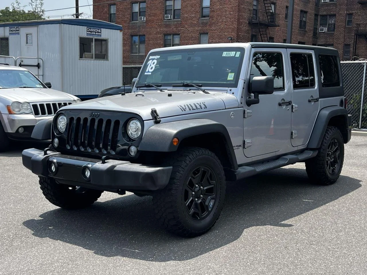 Used 2018 Jeep Wrangler JK Unlimited Willys Wheeler with VIN 1C4BJWDG7JL860073 for sale in Huntington, NY