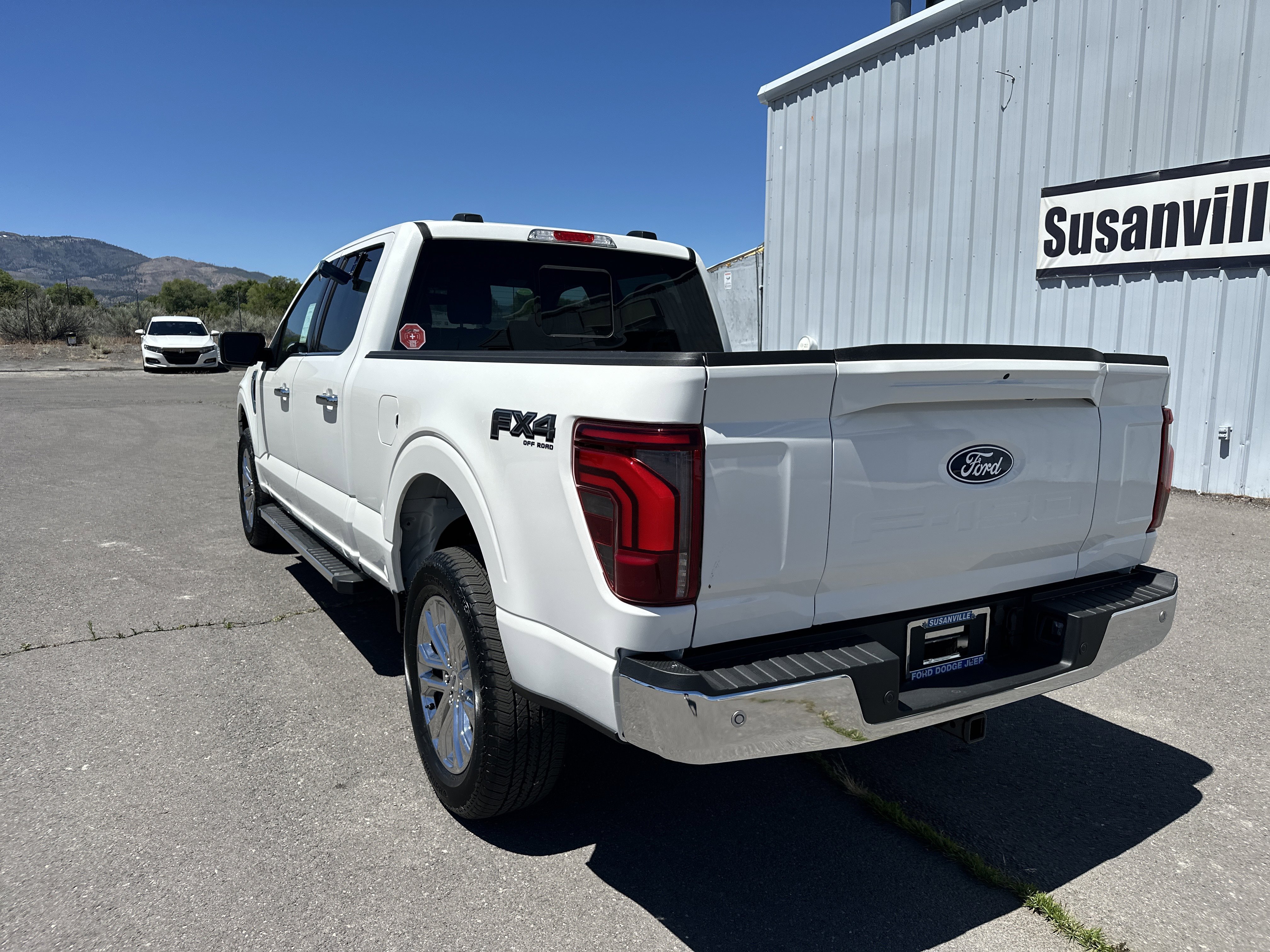 New 2026 Star White Metallic Tri-Coat Ford Lariat® image 1
