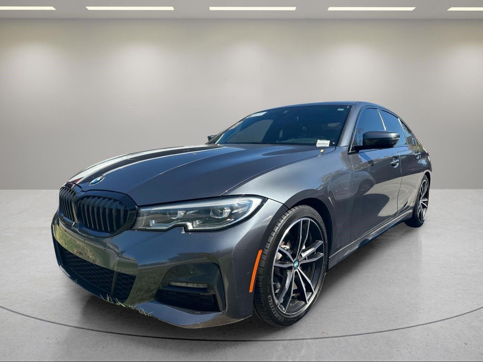 Used 2019 Mineral Gray Metallic BMW 330i xDrive image 1