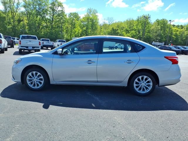 Used 2019 Brilliant Silver Metallic Nissan SV image 4