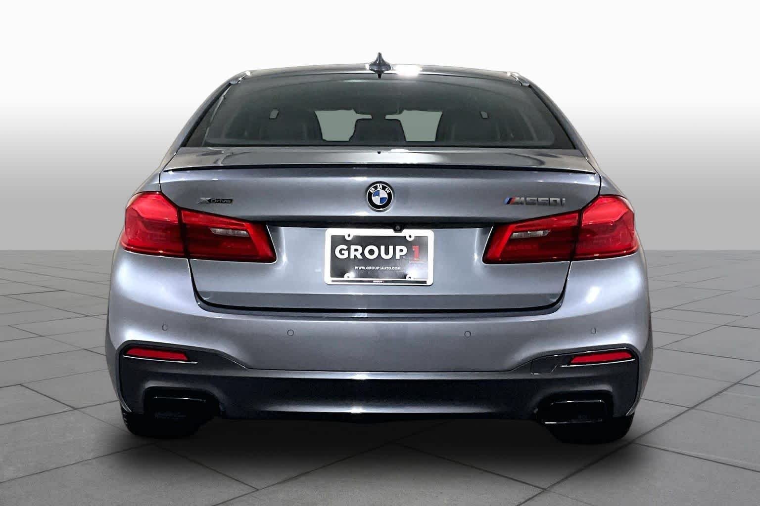 Used 2018 Bluestone Metallic BMW M550i xDrive image 4
