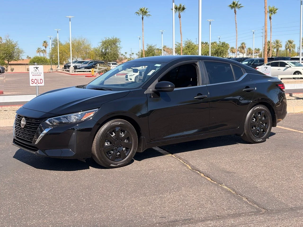 Used 2025 Super Black Nissan S image 1