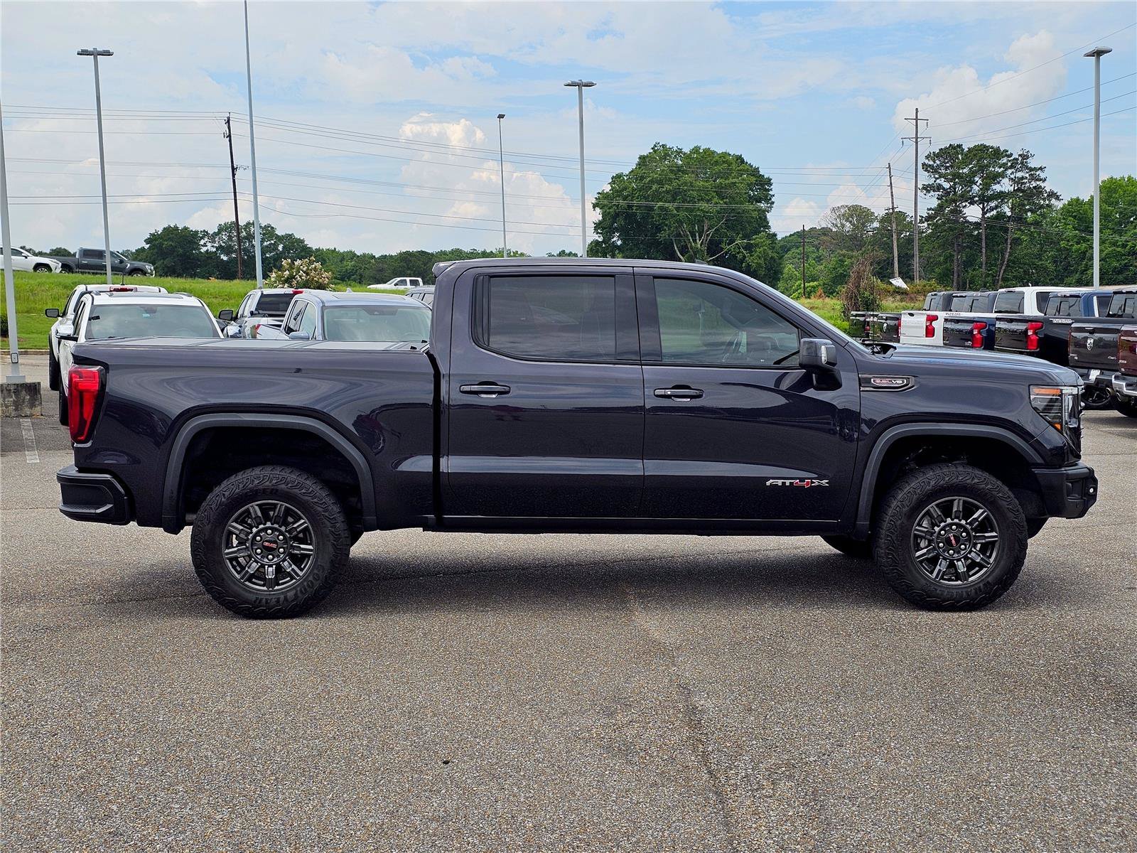 Used 2024 Titanium Rush Metallic GMC AT4X image 9