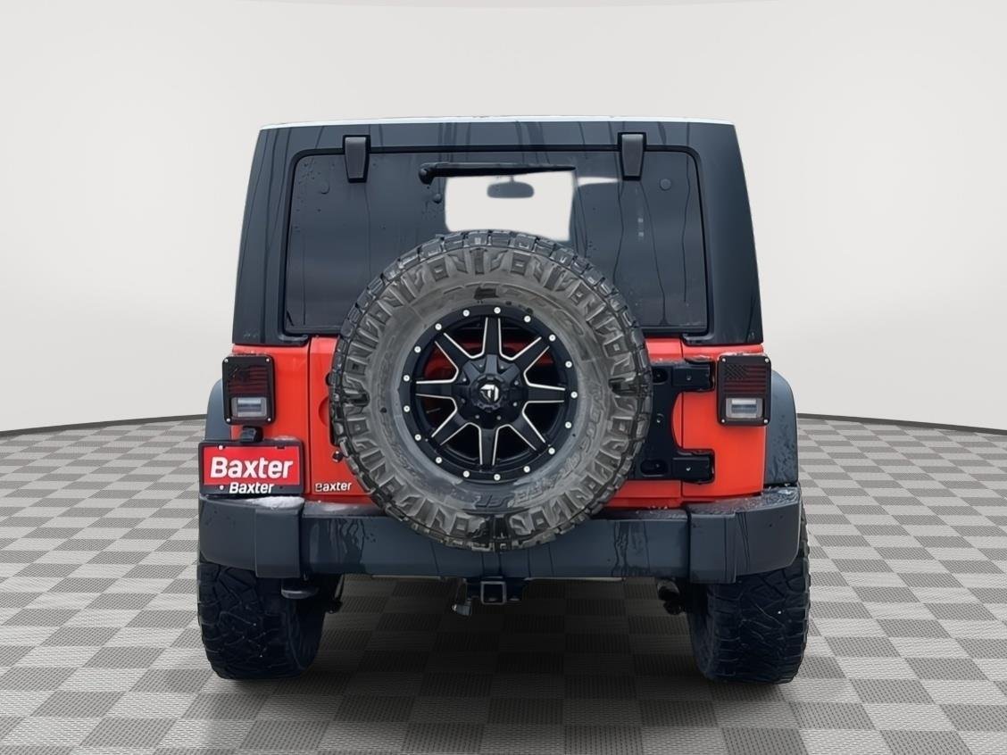 Used 2015 Sunset Orange Pearlcoat Jeep Sport image 4