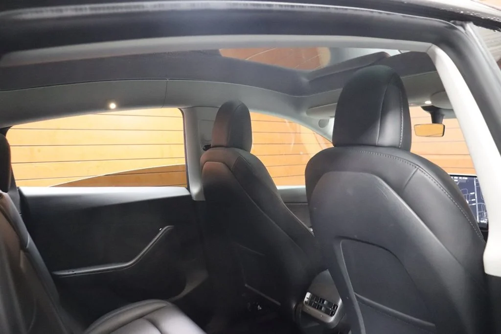 Used 2022 Solid Black Tesla Performance image 56