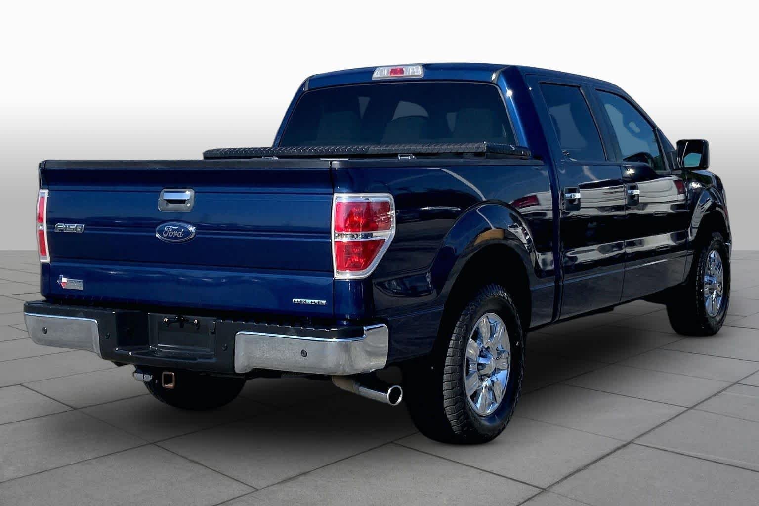 Used 2012 Dark Blue Pearl Metallic Ford XLT image 13