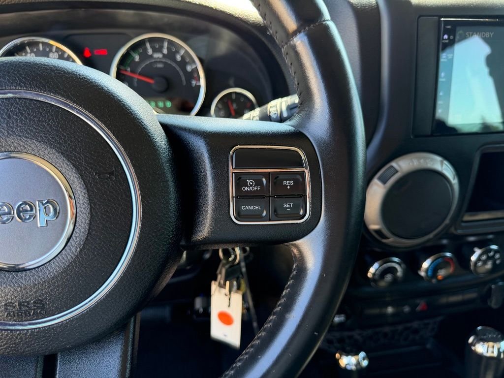 Used 2013 Commando Green Jeep Unlimited Sport image 16