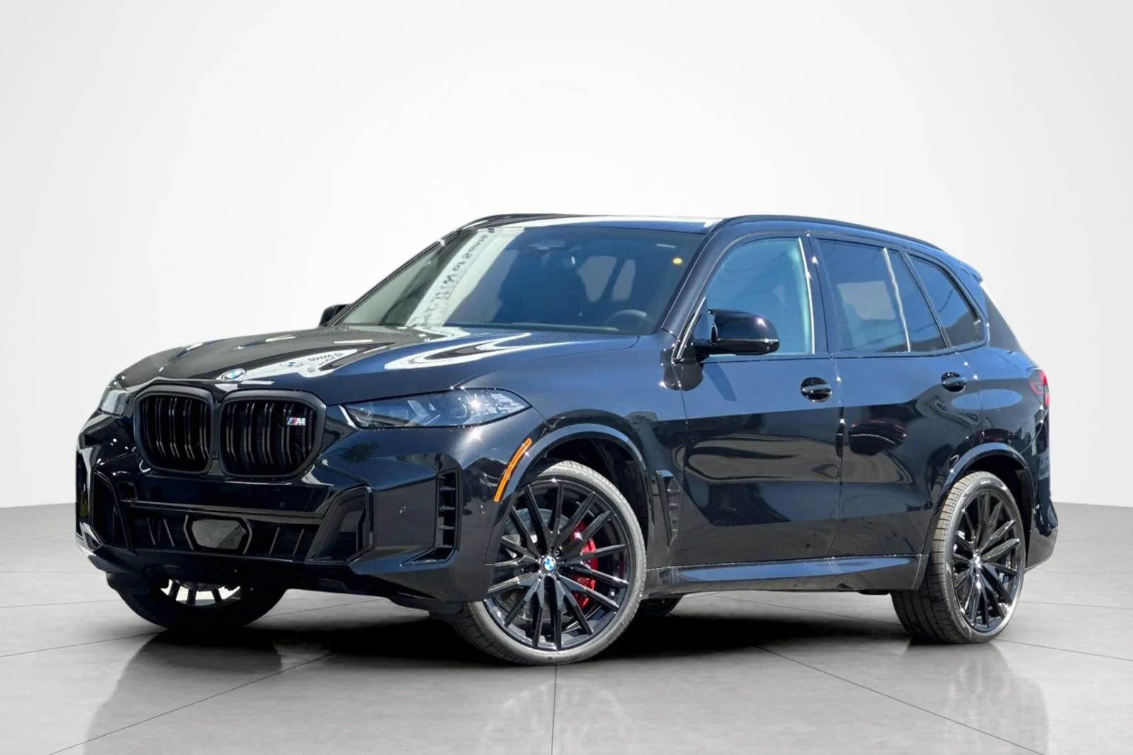 New 2026 Black Sapphire Metallic BMW M60i image 1