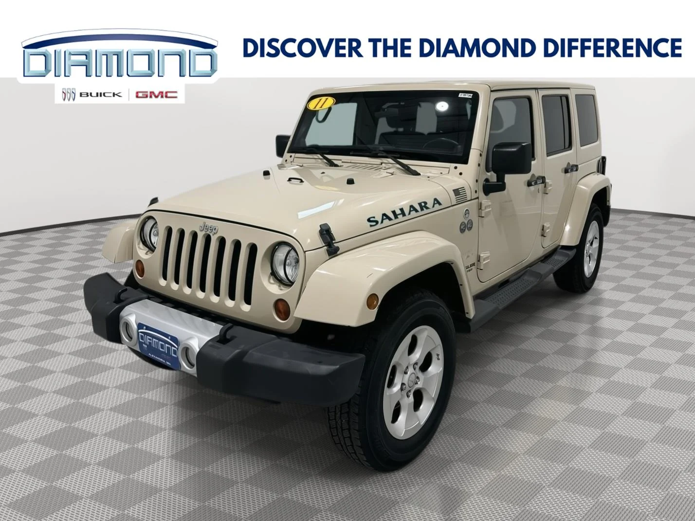 Used 2011 Tan Jeep Sahara image 1