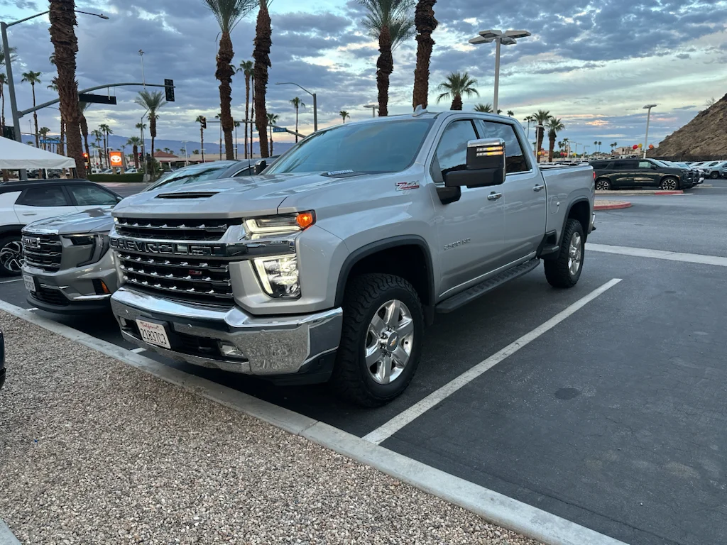 Used 2021 Silver Ice Metallic Chevrolet LTZ image 1