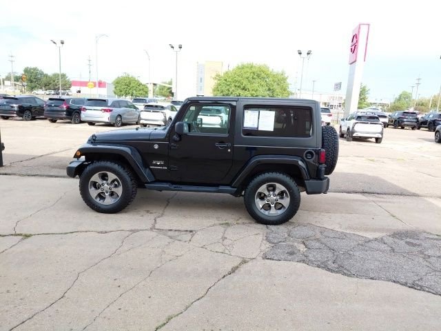 Used 2016 Black Clearcoat Jeep Sahara image 7