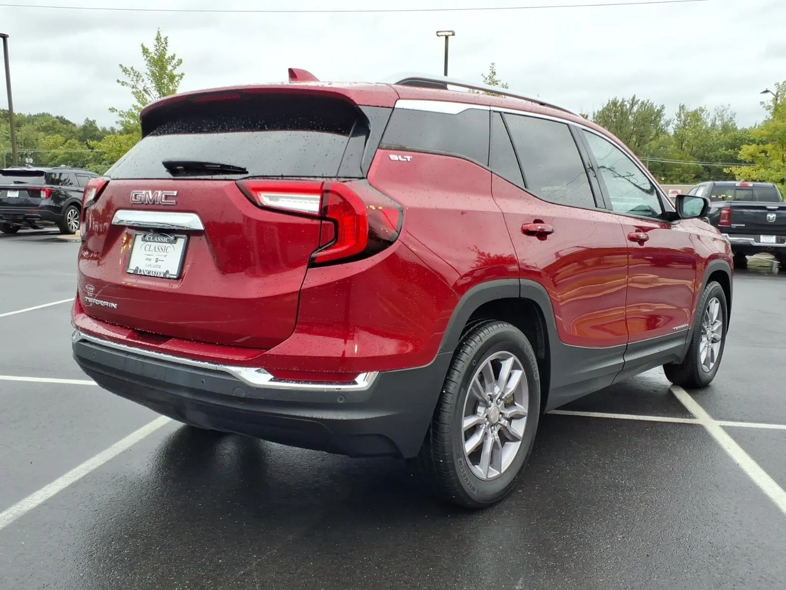 Used 2023 Volcanic Red Tintcoat GMC SLT image 2