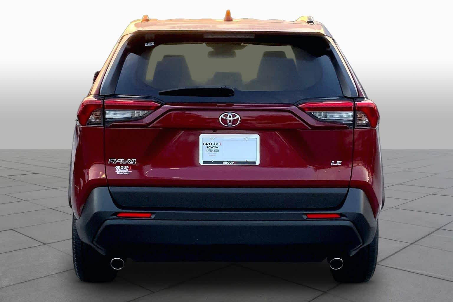 Used 2021 Ruby Flare Pearl Toyota LE image 5