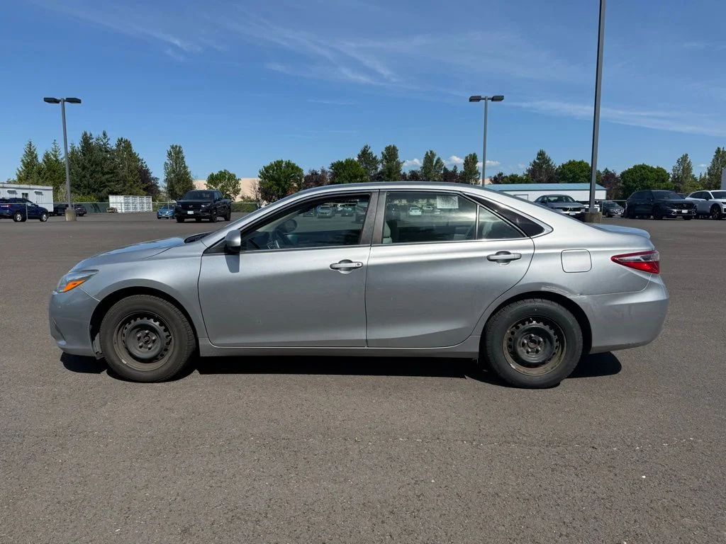 Used 2015 Celestial Silver Metallic Toyota LE image 4