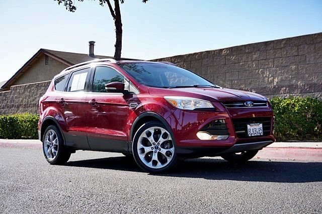 Used 2014 Red Ford Titanium image 1
